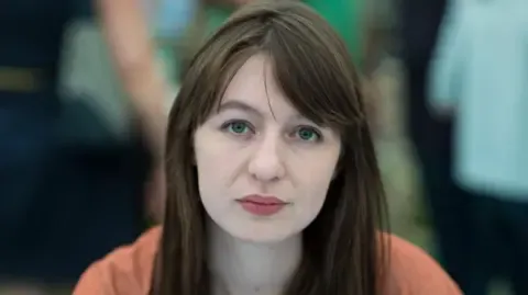 Irish author Sally Rooney declares she is unable to visit the UK over potential arrest